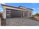 Beautiful single-Gathering home offers an attached garage and attractive desert landscaping at 4353 N 203Rd Ave, Buckeye, AZ 85396