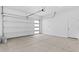 A clean and organized garage with ample space for storage and parking at 4353 N 203Rd Ave, Buckeye, AZ 85396