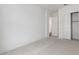 Bedroom featuring neutral carpet and closet at 4359 N 203Rd Ave, Buckeye, AZ 85396