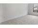 Spacious bedroom featuring neutral carpet and a window with blinds at 4359 N 203Rd Ave, Buckeye, AZ 85396