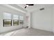Bright bedroom features large windows and neutral colors, creating a relaxing atmosphere at 4359 N 203Rd Ave, Buckeye, AZ 85396