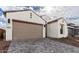 Beautiful home with a neutral palette and an attached two-car garage at 4359 N 203Rd Ave, Buckeye, AZ 85396