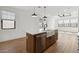 Bright kitchen island featuring stainless steel appliances at 20311 W Montecito Ave, Buckeye, AZ 85396