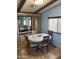 Cozy dining area features a round table with seating for four, perfect for intimate meals at 3330 E Main St # 440, Mesa, AZ 85213