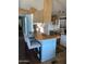 Open kitchen featuring a breakfast bar with seating and standard appliances, providing functionality at 3330 E Main St # 440, Mesa, AZ 85213