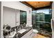 Spa-like bathroom with marble vanity and glass shower at 9556 E Celestial Dr, Scottsdale, AZ 85262