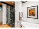 Bathroom with soaking tub and black marble shower at 9556 E Celestial Dr, Scottsdale, AZ 85262