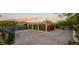 Three-car garage with paver driveway at 9556 E Celestial Dr, Scottsdale, AZ 85262