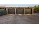 Three-car garage with paver driveway at 9556 E Celestial Dr, Scottsdale, AZ 85262