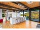 Modern kitchen with island and breakfast bar, mountain views at 9556 E Celestial Dr, Scottsdale, AZ 85262