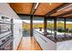 Modern kitchen with stainless steel appliances and stunning mountain views at 9556 E Celestial Dr, Scottsdale, AZ 85262