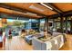 Living area with a built in fire pit and views to the backyard at 9556 E Celestial Dr, Scottsdale, AZ 85262