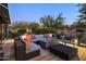 Spacious patio with seating, fire pit, and stunning desert views at 9556 E Celestial Dr, Scottsdale, AZ 85262