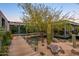 Wooden walkway with desert landscaping at 9556 E Celestial Dr, Scottsdale, AZ 85262