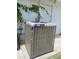 Exterior shot shows the York AC unit of the home, surrounded by some plant growth at 895 W Tyson St, Chandler, AZ 85225