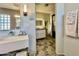 Elegant bathroom with double vanity and hexagon tile at 895 W Tyson St, Chandler, AZ 85225