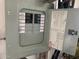 Open electrical panel with documentation on the inside of the cover, showcasing breakers at 895 W Tyson St, Chandler, AZ 85225