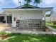 Back of house featuring a patio, covered seating area, and well-maintained yard at 895 W Tyson St, Chandler, AZ 85225