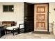 Elegant front entrance featuring a wood door and wrought iron screen at 895 W Tyson St, Chandler, AZ 85225