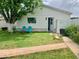 Charming home with a freshly manicured lawn and inviting curb appeal at 895 W Tyson St, Chandler, AZ 85225