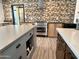 Modern kitchen with stainless steel appliances and custom cabinetry at 895 W Tyson St, Chandler, AZ 85225