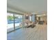 Living area with sliding doors leading to the pool and patio at 895 W Tyson St, Chandler, AZ 85225