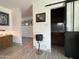 Convenient wet bar with sliding barn door and stylish sink at 895 W Tyson St, Chandler, AZ 85225