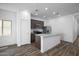 Well-lit kitchen featuring stainless steel appliances, a center island, and recessed lighting at 24606 W St Catherine Ave, Buckeye, AZ 85326