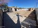 Large backyard with shed, concrete, and block fence at 5559 N 62Nd Ave, Glendale, AZ 85301