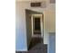 Hallway featuring tile floors and storage area at 5559 N 62Nd Ave, Glendale, AZ 85301