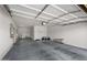 Two-car garage with automatic door opener at 42459 W Paseo Dr, Maricopa, AZ 85138
