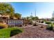 Inviting Presidio residents' club sign with beautiful desert landscaping in a well-maintained community at 15175 S 185Th Ave, Goodyear, AZ 85338