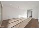 Bright and airy living room with hardwood floors and recessed lighting at 13567 W Steed Ridge Rd, Peoria, AZ 85383