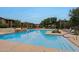 Sparkling community pool with lounge chairs at 2425 W Bronco Butte Trl # 2017, Phoenix, AZ 85085