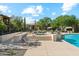 Community spa and pool with lounge chairs at 2425 W Bronco Butte Trl # 2017, Phoenix, AZ 85085