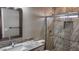 Bathroom with granite vanity and glass shower at 3915 N Juniper Dr, Eloy, AZ 85131