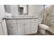 White vanity with granite countertop and ample storage at 3915 N Juniper Dr, Eloy, AZ 85131