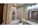 Full bathroom with tub, shower, granite vanity and mirror at 3915 N Juniper Dr, Eloy, AZ 85131