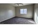 Bright bedroom with neutral walls and carpet flooring at 3915 N Juniper Dr, Eloy, AZ 85131