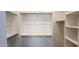 Walk-in closet with ample shelving and hanging rods at 3915 N Juniper Dr, Eloy, AZ 85131