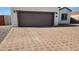 Neatly paved driveway with a brick pattern at 3915 N Juniper Dr, Eloy, AZ 85131