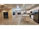 Open concept kitchen with island, stainless steel appliances, and granite countertops at 3915 N Juniper Dr, Eloy, AZ 85131