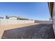 Spacious backyard with block wall for privacy at 19020 W Ocotillo Rd, Waddell, AZ 85355