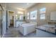 Bathroom with granite countertop, bathtub, and walk-in shower at 19020 W Ocotillo Rd, Waddell, AZ 85355