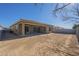 House with covered patio and a large backyard at 260 S 165Th Ave, Goodyear, AZ 85338