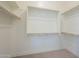 Large walk-in closet with double hanging rods and shelving at 260 S 165Th Ave, Goodyear, AZ 85338
