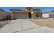 New construction home with a two-car garage and front yard at 260 S 165Th Ave, Goodyear, AZ 85338