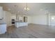 Modern kitchen with island and white cabinetry at 260 S 165Th Ave, Goodyear, AZ 85338