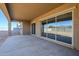 Covered patio with sliding glass doors at 6722 N 190Th Dr, Waddell, AZ 85355