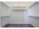 Spacious walk-in closet with ample shelving and hanging space at 6722 N 190Th Dr, Waddell, AZ 85355